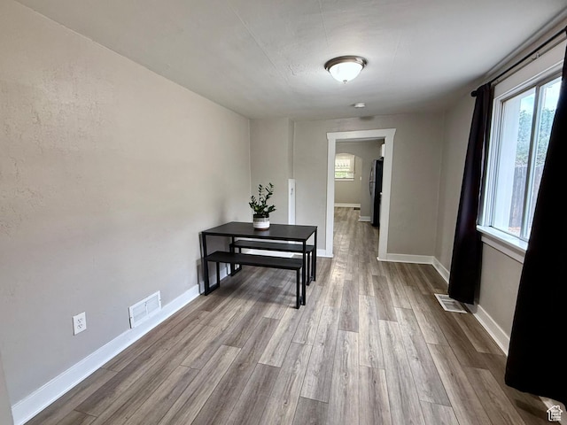 78 N N 3rd St N, Tooele, UT 84074 - corridor featuring plenty of natural light and wood finished floors