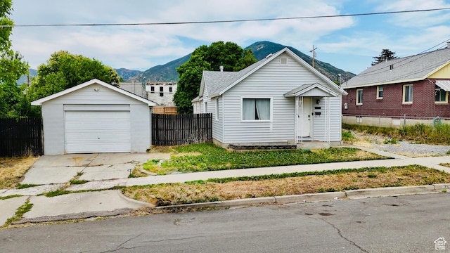 78 N N 3rd St N, Tooele, UT 84074 - bungalow-style home with an outdoor structure, a garage, driveway, and a mountain view
