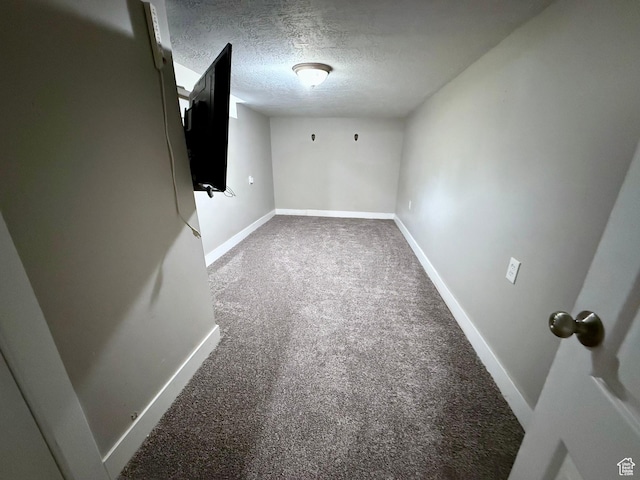 78 N N 3rd St N, Tooele, UT 84074 - spare room with carpet flooring and a textured ceiling