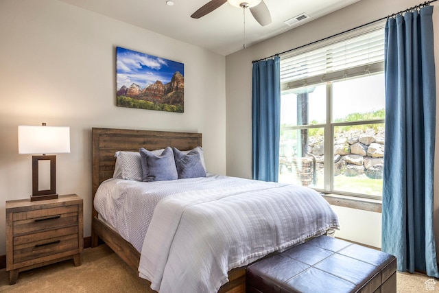 1161 W Wintercress Trl W Unit 27F, Kamas, UT 84036 - bedroom with carpet flooring, multiple windows, and a ceiling fan