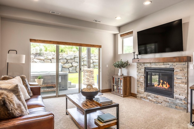 1161 W Wintercress Trl W Unit 27F, Kamas, UT 84036 - carpeted living room featuring a fireplace and recessed lighting