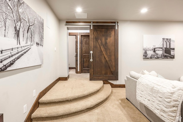 1161 W Wintercress Trl W Unit 27F, Kamas, UT 84036 - bedroom featuring carpet flooring, a barn door, and recessed lighting