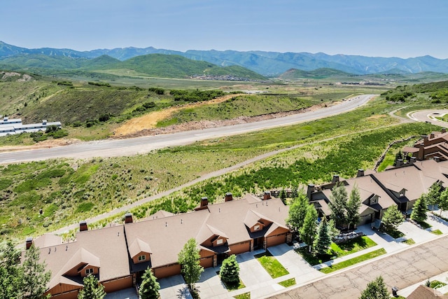 1161 W Wintercress Trl W Unit 27F, Kamas, UT 84036 - aerial perspective of suburban area featuring a mountain backdrop