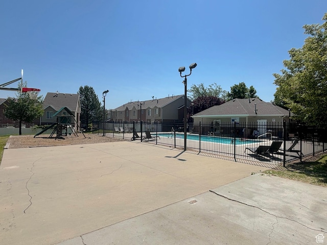 10521 S Sage Flats Way S, Jordan, UT 84009 - community pool featuring a residential view and a patio