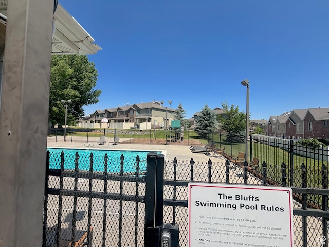 10521 S Sage Flats Way S, Jordan, UT 84009 - community pool featuring a residential view