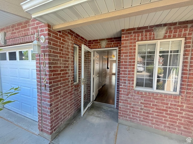 10521 S Sage Flats Way S, Jordan, UT 84009 - entrance to property featuring brick siding and a garage