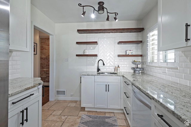 2090 E Crystal Ave S, Salt Lake City, UT 84109 - kitchen featuring open shelves, dishwashing machine, backsplash, and white cabinetry