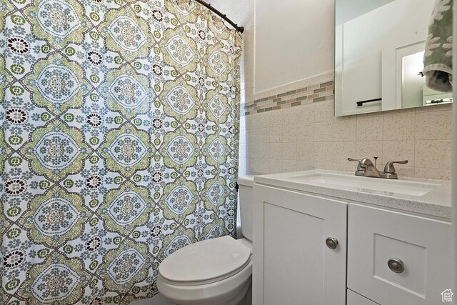 2090 E Crystal Ave S, Salt Lake City, UT 84109 - full bath with vanity, a shower with shower curtain, tile walls, and decorative backsplash