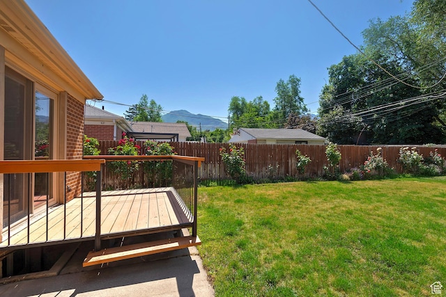 2090 E Crystal Ave S, Salt Lake City, UT 84109 - view of yard with a deck with mountain view