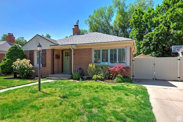 2090 E Crystal Ave S, Salt Lake City, UT 84109 - view of front of home featuring brick siding, a gate, and a chimney
