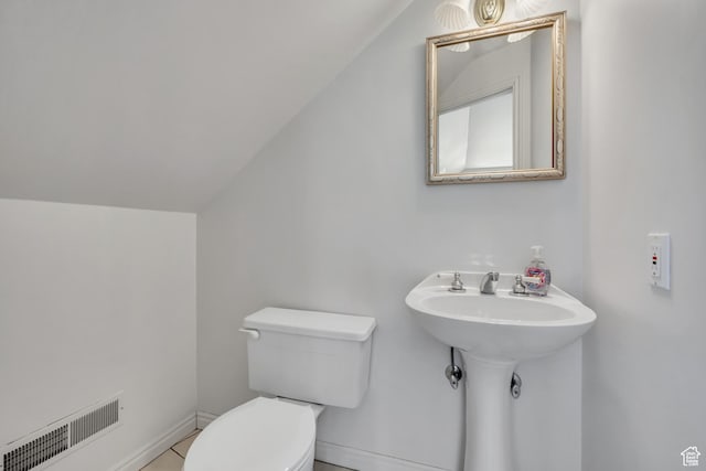 1040 E 900 N, Orem, UT 84097 - bathroom featuring vaulted ceiling and tile patterned flooring