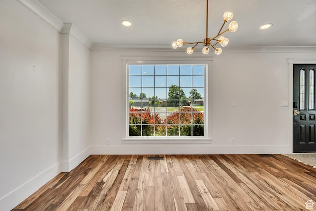 1040 E 900 N, Orem, UT 84097 - unfurnished dining area featuring ornamental molding, a chandelier, wood finished floors, and recessed lighting