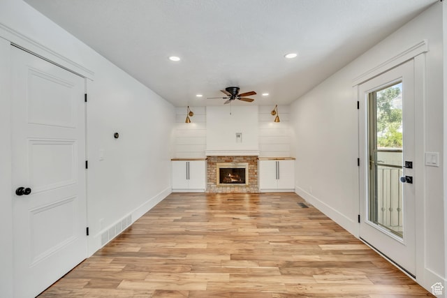 1040 E 900 N, Orem, UT 84097 - unfurnished living room with ceiling fan, recessed lighting, light wood-type flooring, and a brick fireplace