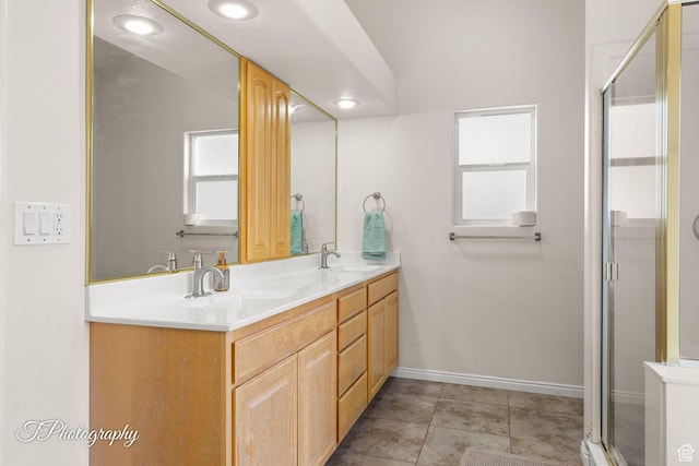 2640 W 200 N, Hurricane, UT 84737 - bathroom with double vanity, a shower stall, tile patterned flooring, and recessed lighting