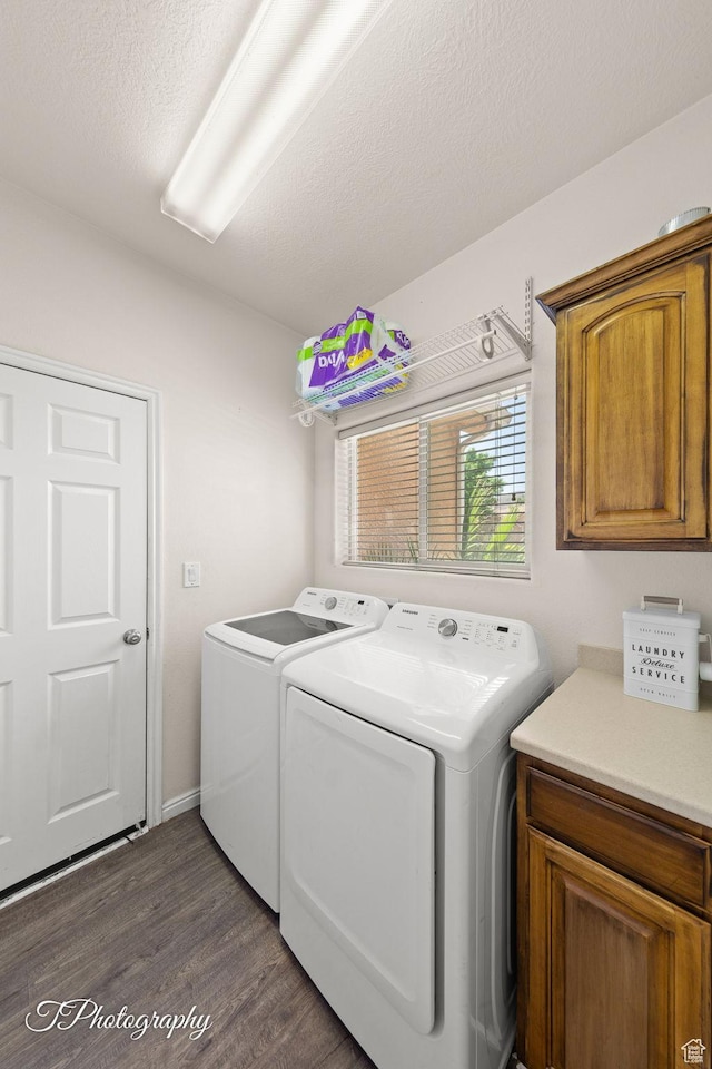 2640 W 200 N, Hurricane, UT 84737 - laundry room featuring washing machine and clothes dryer, dark wood finished floors, and cabinet space