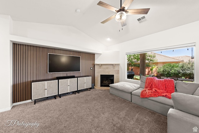 2640 W 200 N, Hurricane, UT 84737 - living area featuring carpet floors, lofted ceiling, a ceiling fan, and a tiled fireplace