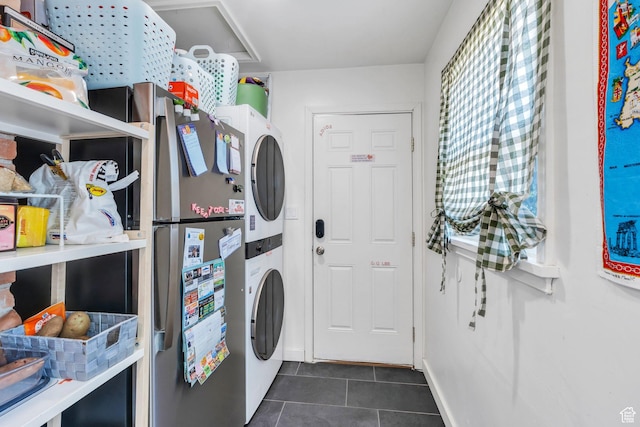 555 N 800 E, Provo, UT 84606 - washroom with stacked washing machine and dryer and dark tile patterned flooring