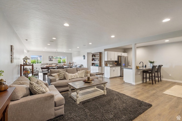 1414 S 790 E, Salem, UT 84653 - living room with light wood-type flooring and recessed lighting