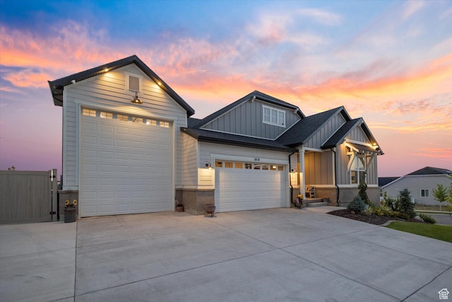 1414 S 790 E, Salem, UT 84653 - view of front of property with board and batten siding, concrete driveway, and a garage