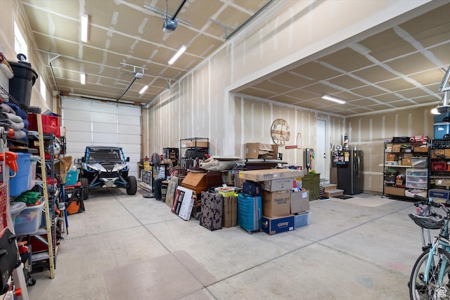 1414 S 790 E, Salem, UT 84653 - garage with black refrigerator with ice dispenser