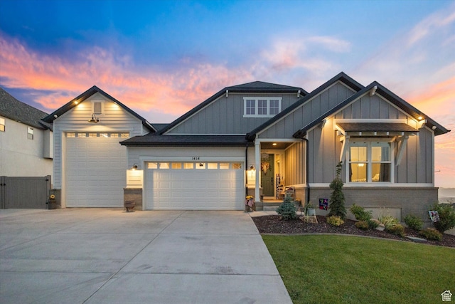 1414 S 790 E, Salem, UT 84653 - view of front of property with board and batten siding, driveway, an attached garage, and a front yard