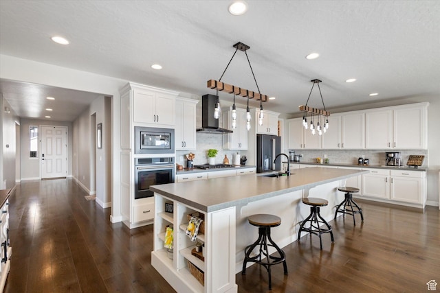 1414 S 790 E, Salem, UT 84653 - kitchen with appliances with stainless steel finishes, wall chimney range hood, open shelves, backsplash, and recessed lighting