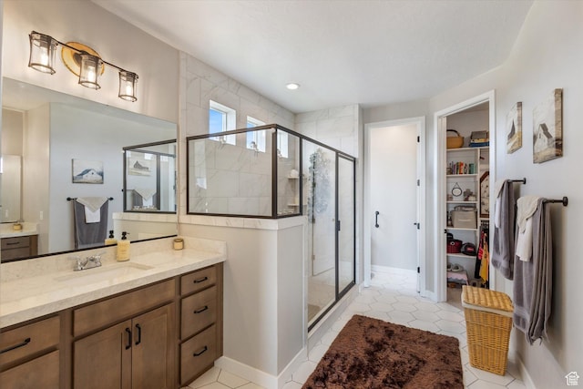 1414 S 790 E, Salem, UT 84653 - bathroom with a spacious closet, a stall shower, vanity, and tile patterned flooring