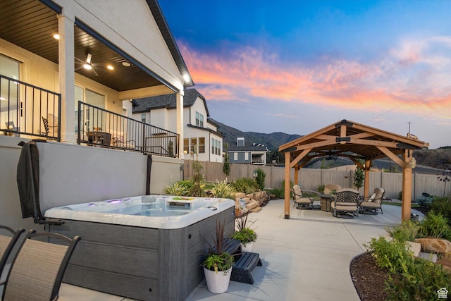1414 S 790 E, Salem, UT 84653 - fenced backyard with a gazebo, a hot tub, a patio area, and a mountain view