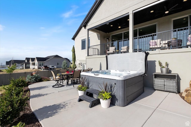 1414 S 790 E, Salem, UT 84653 - view of patio featuring a hot tub, a ceiling fan, outdoor dining space, and a residential view