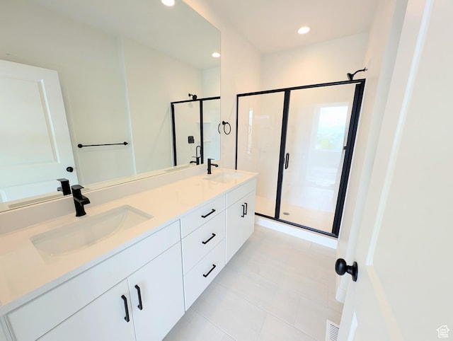 10634 S Cardinal Park Rd W Unit 148, South Jordan, UT 84009 - full bathroom featuring tile patterned flooring, a stall shower, double vanity, and recessed lighting