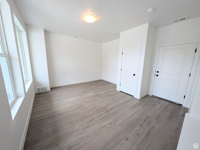 10634 S Cardinal Park Rd W Unit 148, South Jordan, UT 84009 - unfurnished bedroom with wood finished floors and baseboards