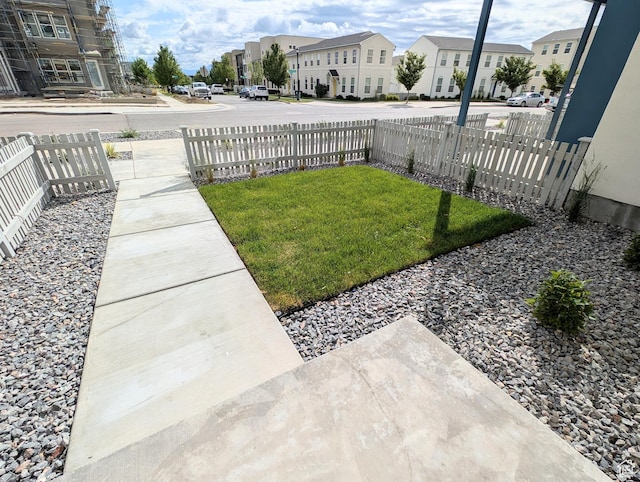10634 S Cardinal Park Rd W Unit 148, South Jordan, UT 84009 - view of yard with a residential view