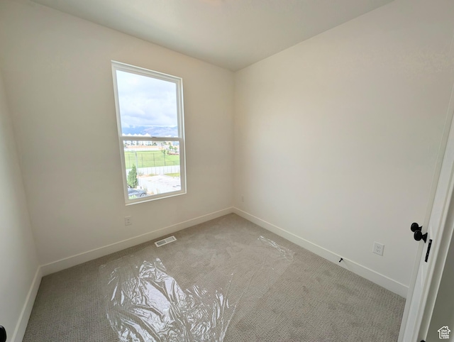10634 S Cardinal Park Rd W Unit 148, South Jordan, UT 84009 - carpeted spare room with baseboards