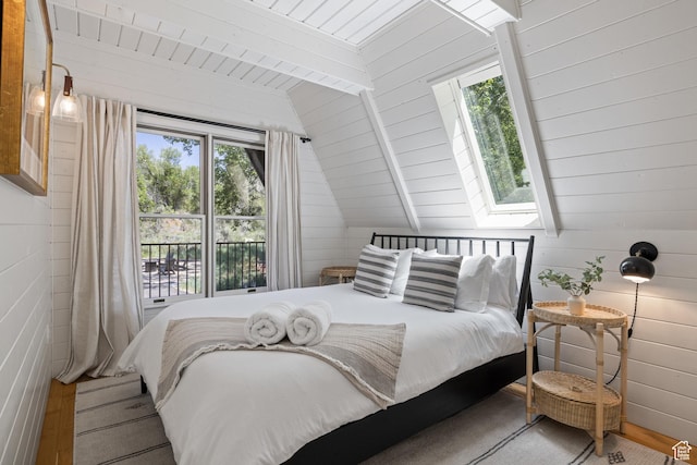 7630 Lake Creek Rd, Heber City, UT 84032 - bedroom with multiple windows, lofted ceiling, wood finished floors, a skylight, and wooden ceiling