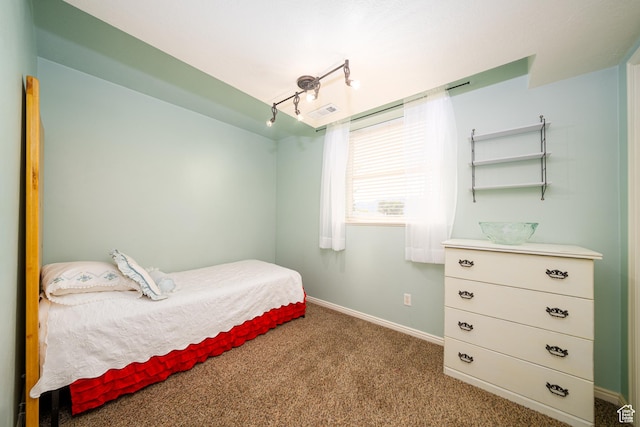 2891 S 600 W, Nibley, UT 84321 - carpeted bedroom featuring baseboards and rail lighting
