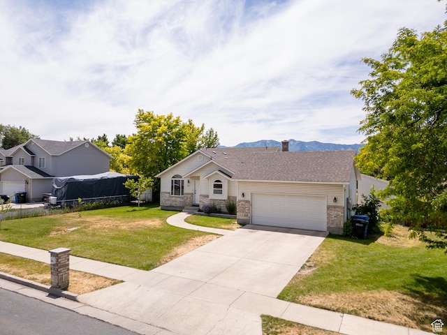 2891 S 600 W, Nibley, UT 84321 - view of front of property with a garage, driveway, a chimney, and a mountain view