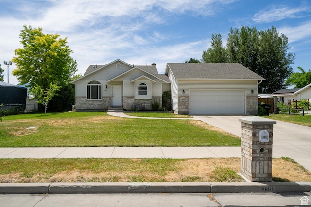 2891 S 600 W, Nibley, UT 84321 - view of front of property featuring driveway, an attached garage, and brick siding