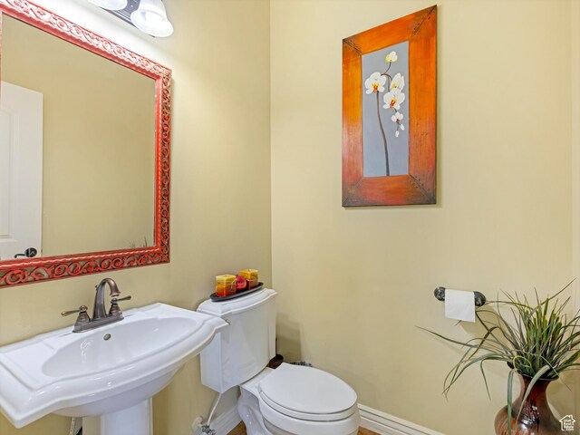 385 W Riverside Ln, Spanish Fork, UT 84660 - half bathroom with a sink and toilet