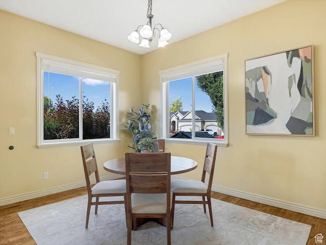 385 W Riverside Ln, Spanish Fork, UT 84660 - dining area with a chandelier and wood finished floors