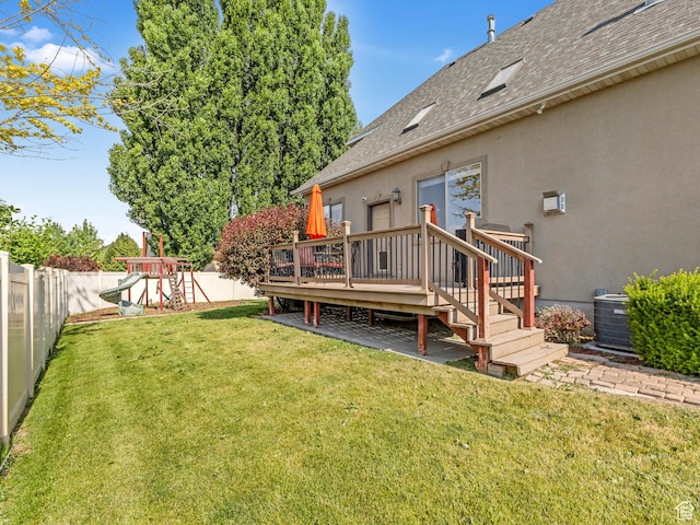 385 W Riverside Ln, Spanish Fork, UT 84660 - fenced backyard with a wooden deck and a playground