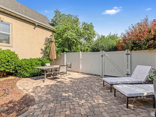 385 W Riverside Ln, Spanish Fork, UT 84660 - view of patio / terrace with a gate and outdoor dining area