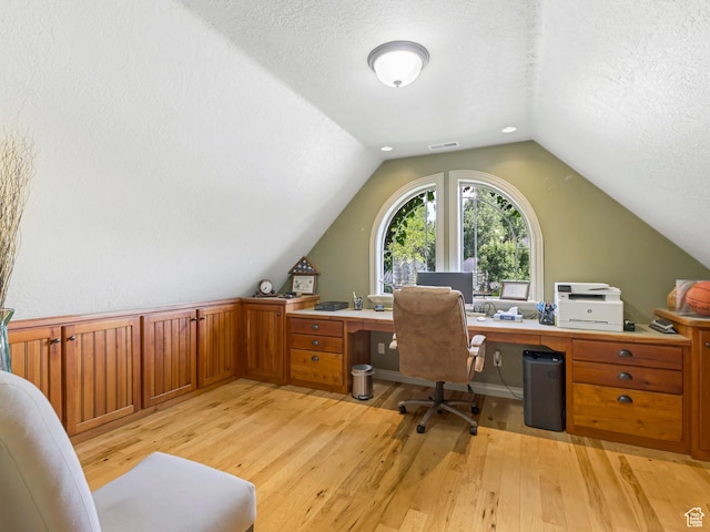 385 W Riverside Ln, Spanish Fork, UT 84660 - office featuring light wood-style flooring, lofted ceiling, and a textured ceiling