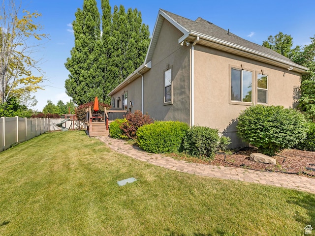 385 W Riverside Ln, Spanish Fork, UT 84660 - view of side of property featuring a deck and stucco siding