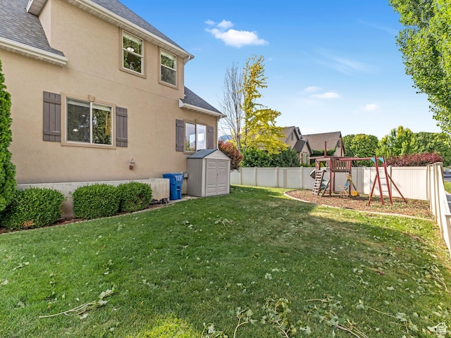 385 W Riverside Ln, Spanish Fork, UT 84660 - fenced backyard with a storage shed and a playground
