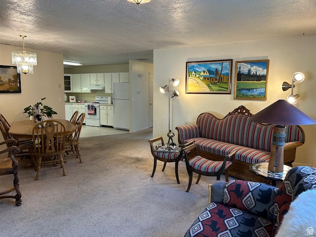 2839 S Vanburen Ave E Unit 8, Ogden, UT 84403 - living area with a textured ceiling, a chandelier, and light carpet