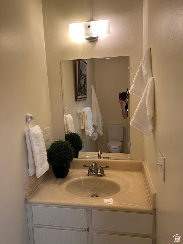 2839 S Vanburen Ave E Unit 8, Ogden, UT 84403 - half bath with vanity and toilet