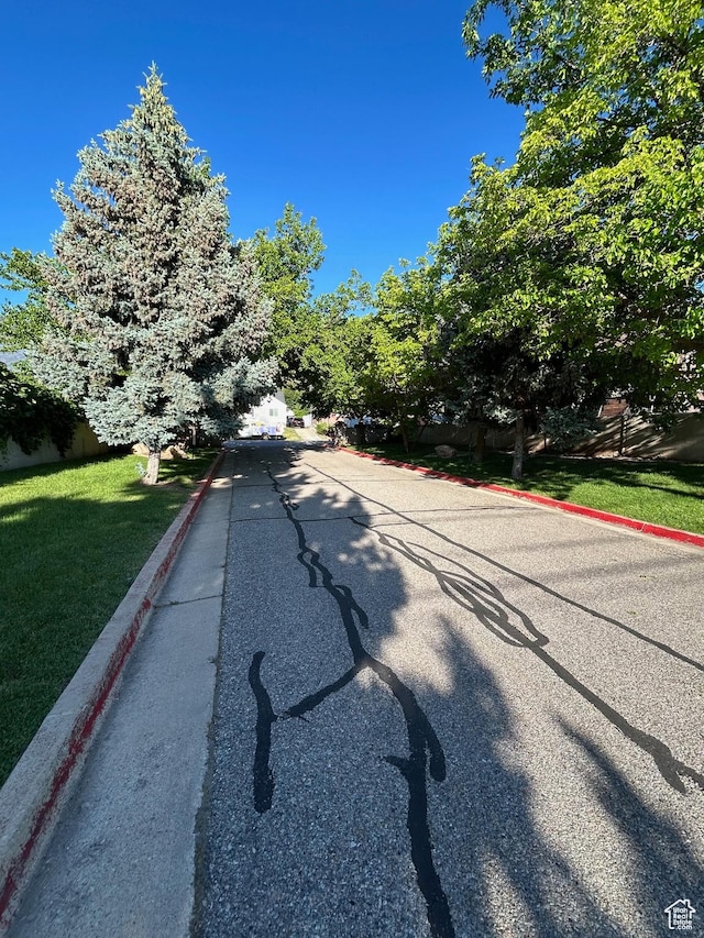 2839 S Vanburen Ave E Unit 8, Ogden, UT 84403 - view of asphalt street featuring curbs