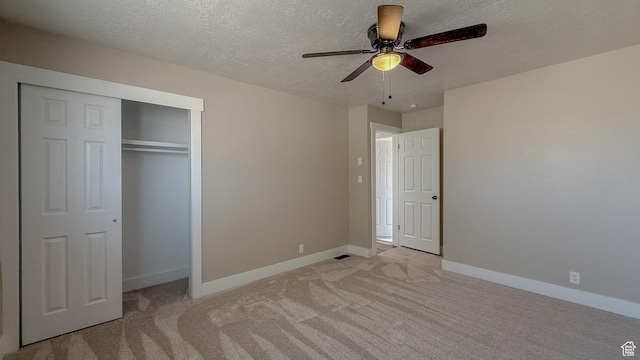 7166 S 4000 E, Price, UT 84501 - unfurnished bedroom featuring light carpet, a closet, a textured ceiling, and a ceiling fan