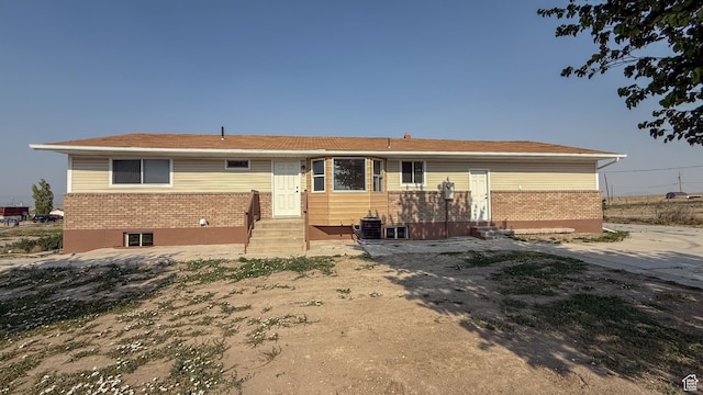 7166 S 4000 E, Price, UT 84501 - back of property featuring brick siding