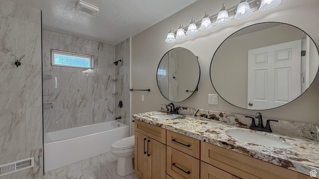 7166 S 4000 E, Price, UT 84501 - bathroom featuring double vanity, shower / bath combination, marble finish floors, and a textured ceiling